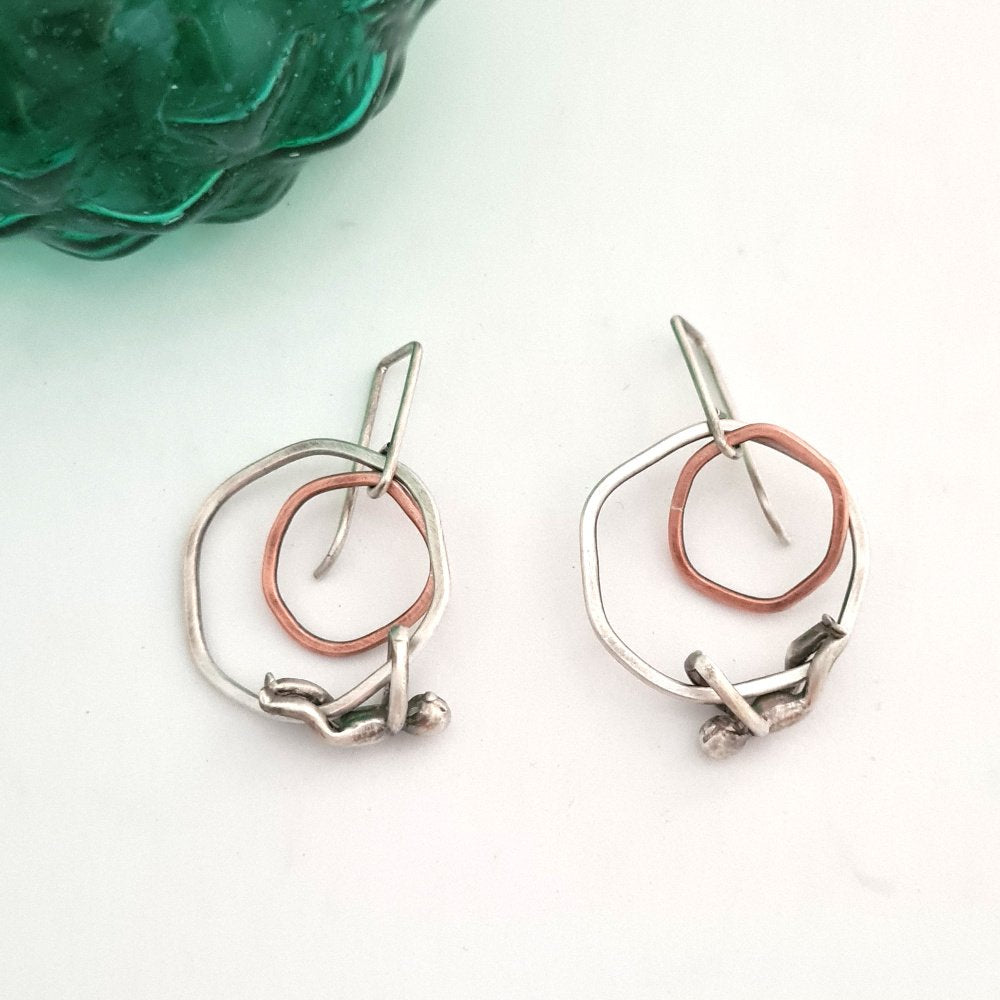 Silver and Copper Flat Rings Earrings with Little Men Hanging
