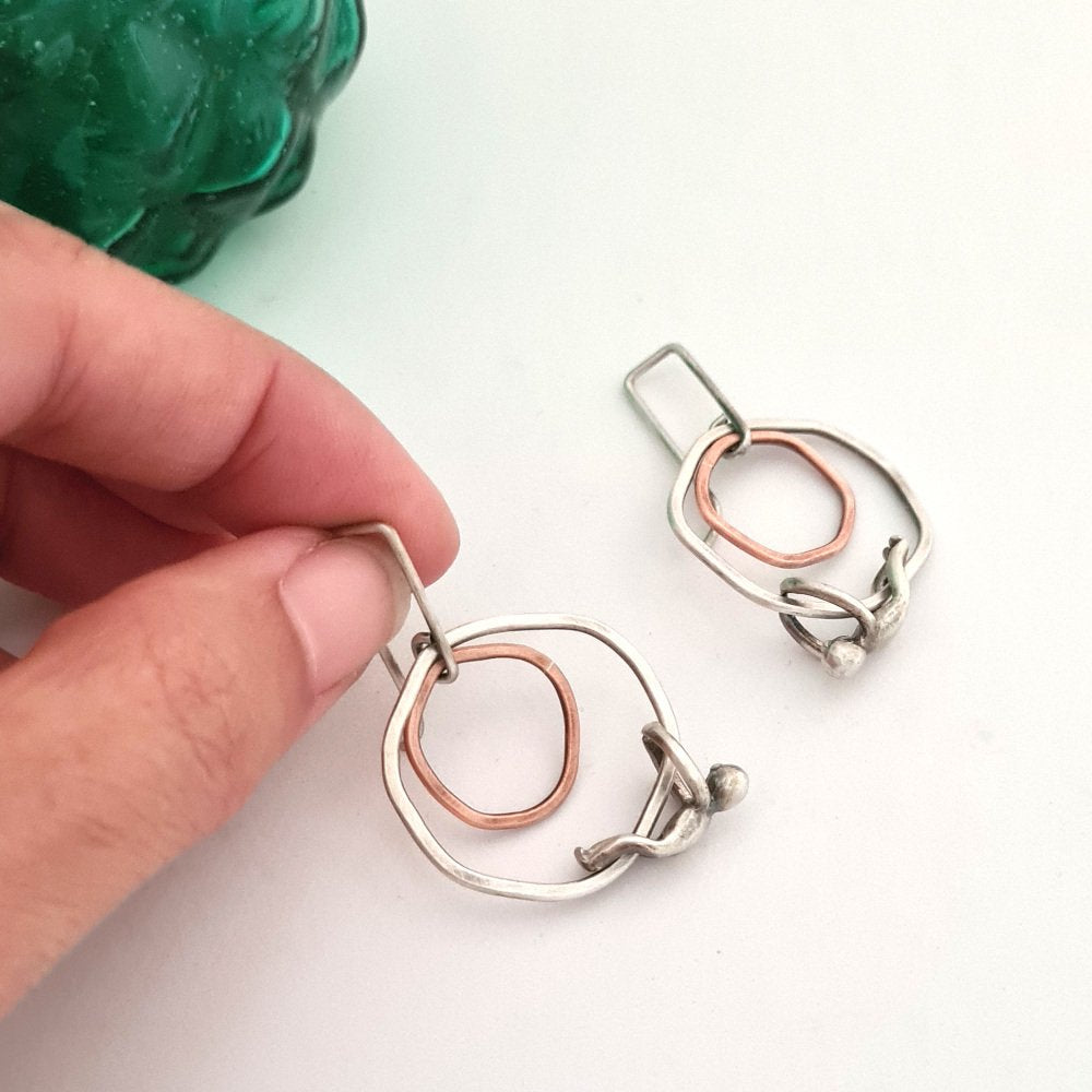 Silver and Copper Flat Rings Earrings with Little Men Hanging