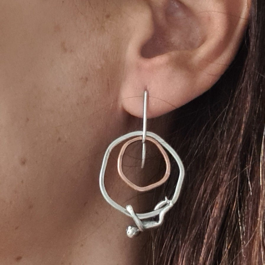 Silver and Copper Flat Rings Earrings with Little Men Hanging