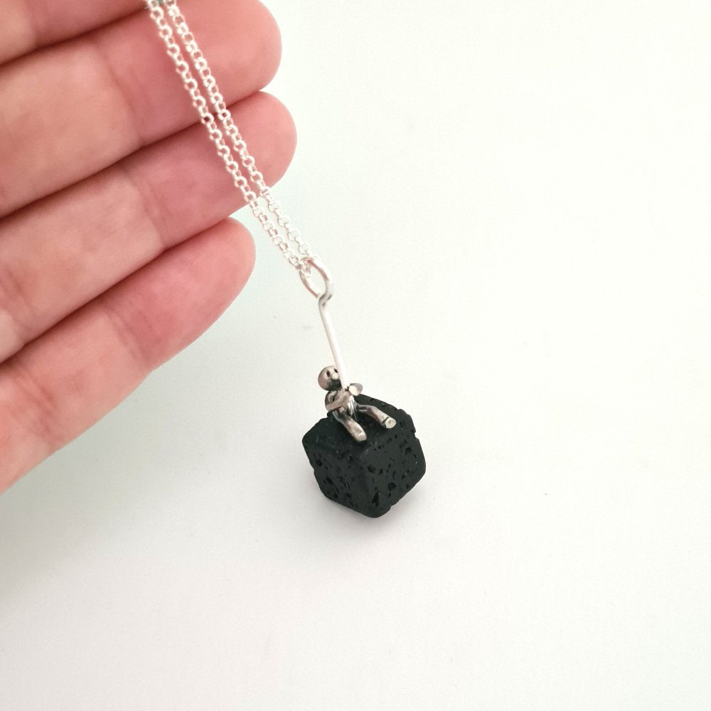 Volcanic Lava and Little Man Sitting