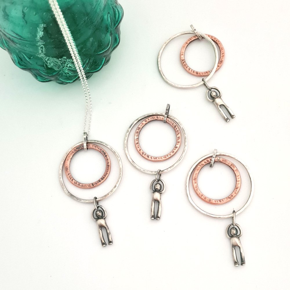 Sterling Silver and Copper Hammered Rings Pendant