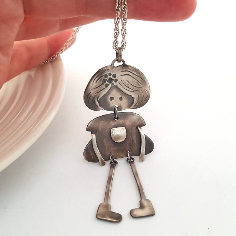 Doll Figure Pendant With Flower - Sterling Silver