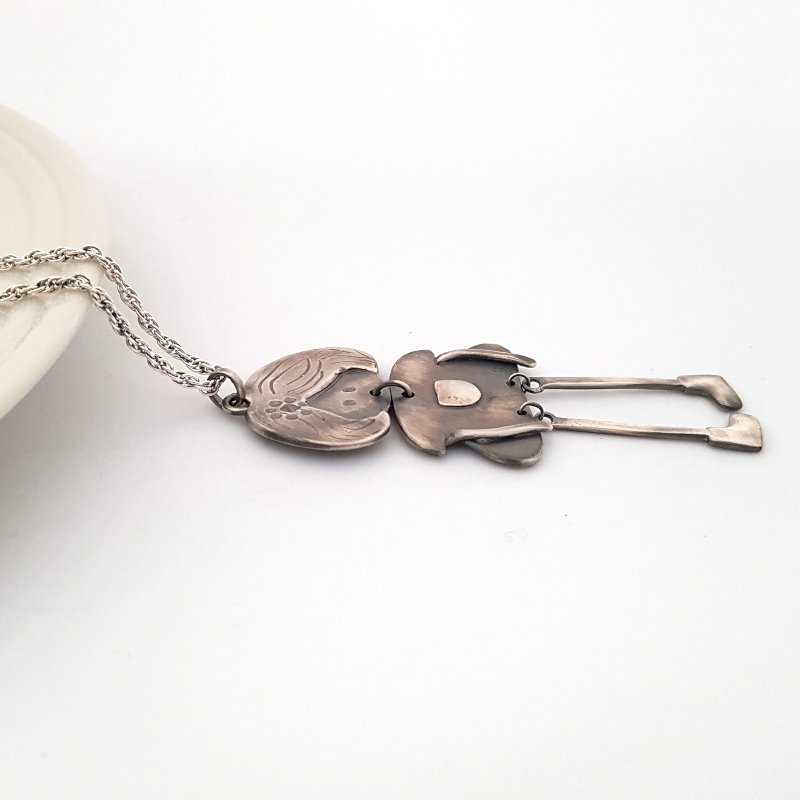 Doll Figure Pendant With Flower - Sterling Silver