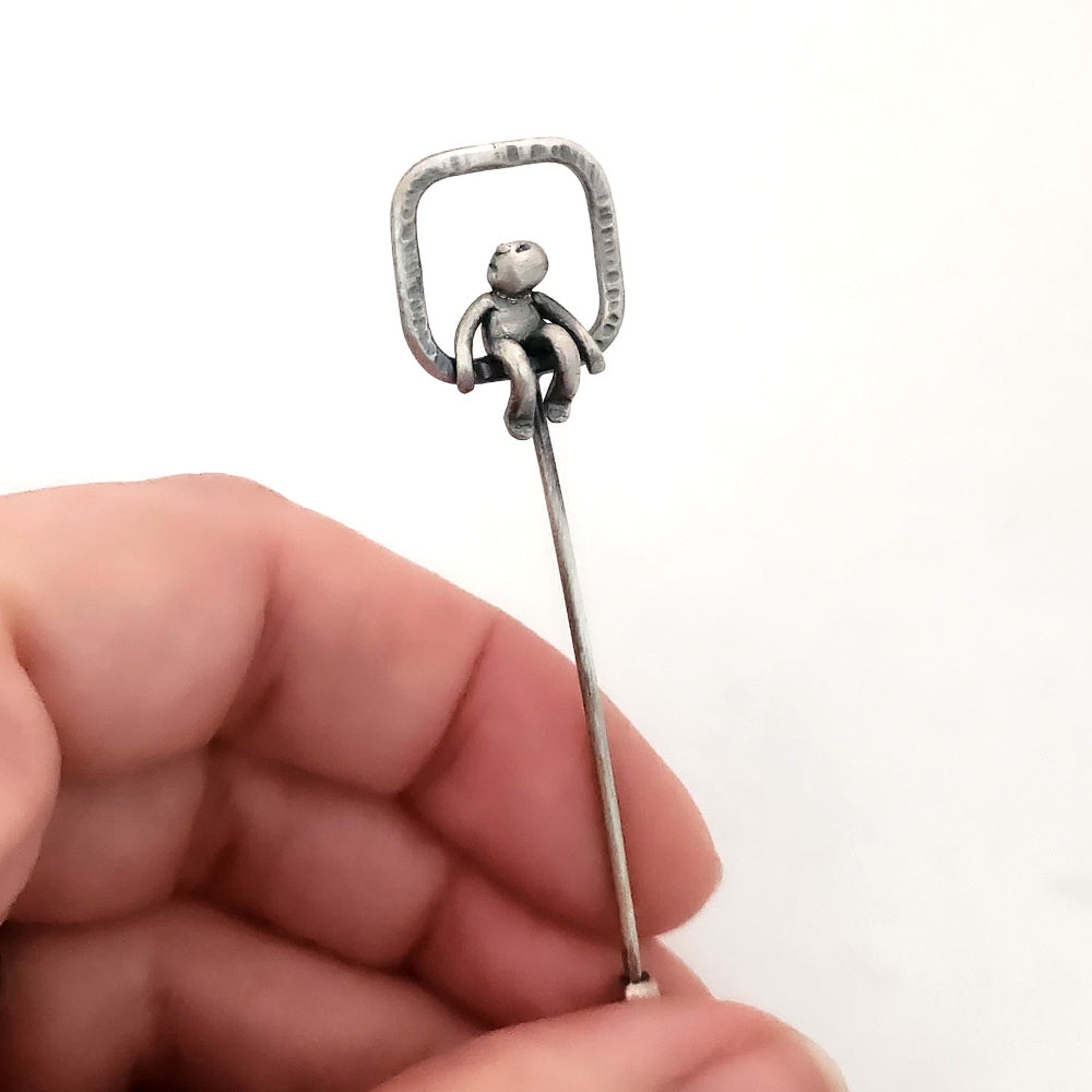 Hammered Stick Pin With Little Man Sitting