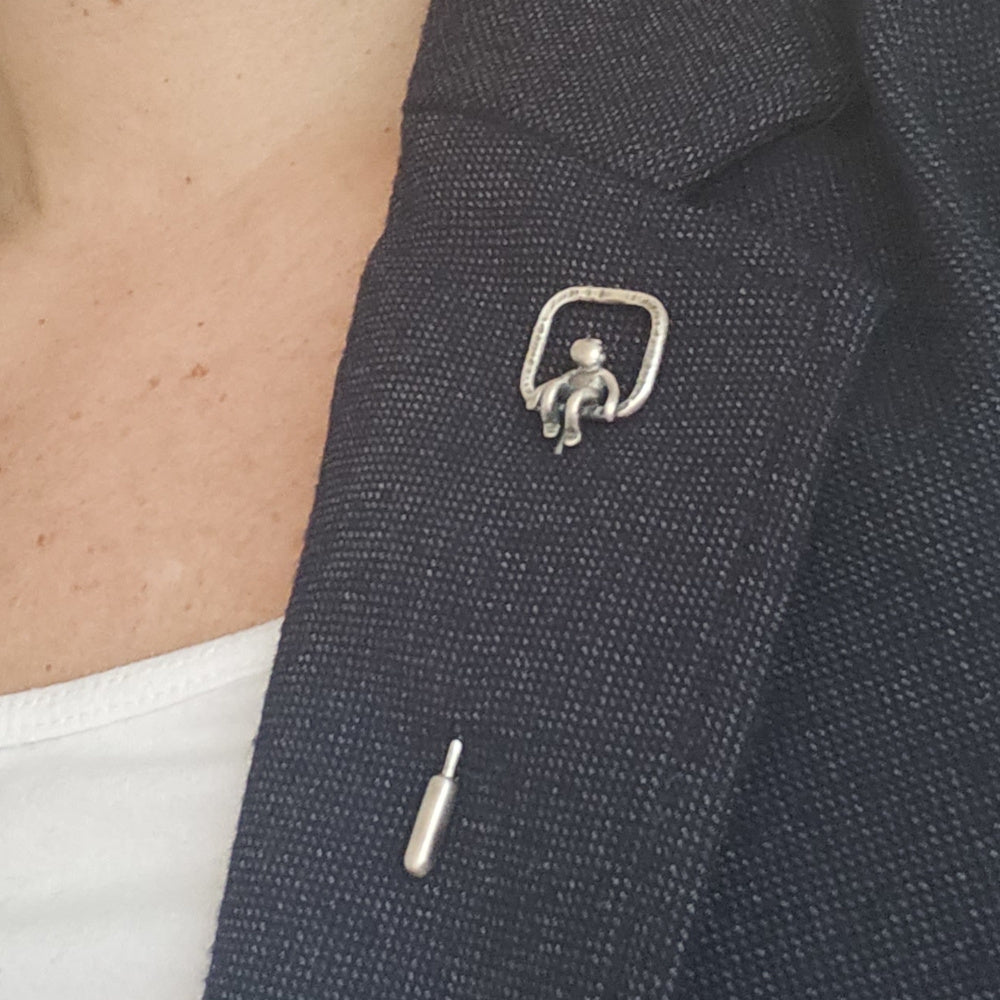 Hammered Stick Pin With Little Man Sitting