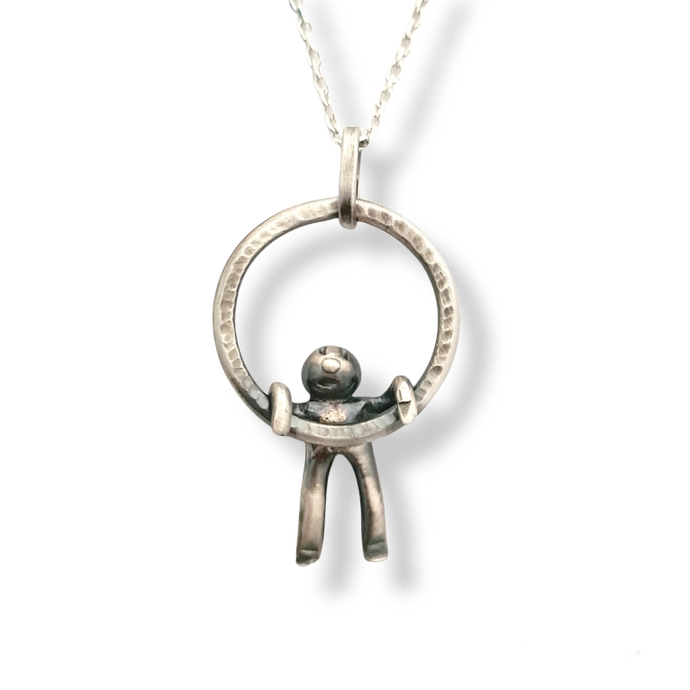 Small Hammered Ring With Little Man Hanging